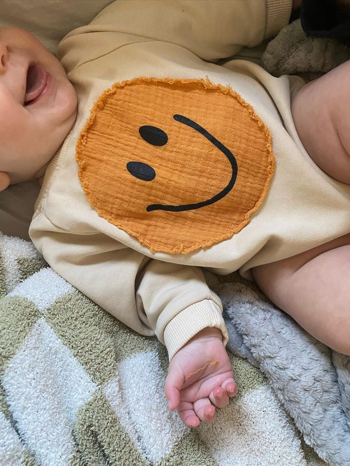 smiley onesie - beige