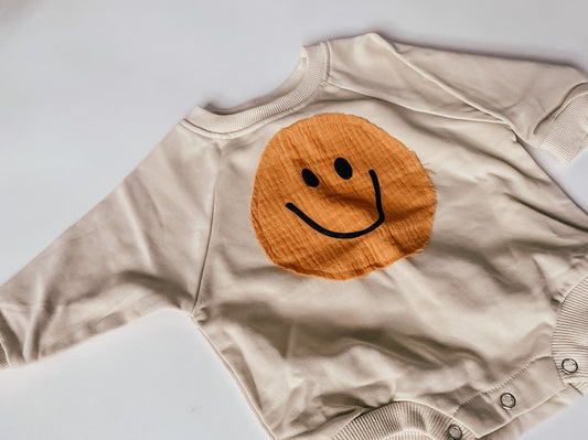 smiley onesie - beige