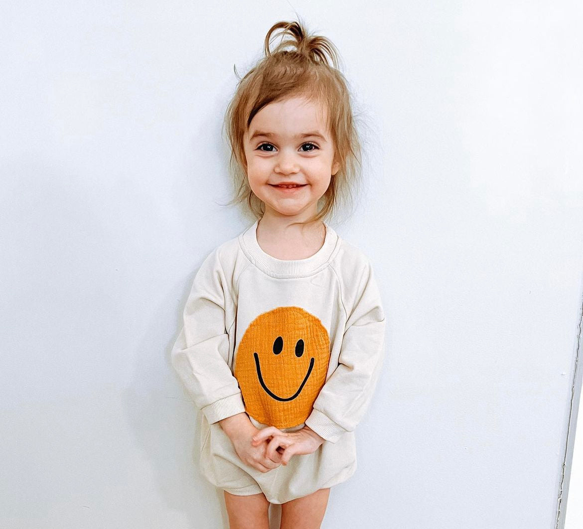 smiley onesie - beige